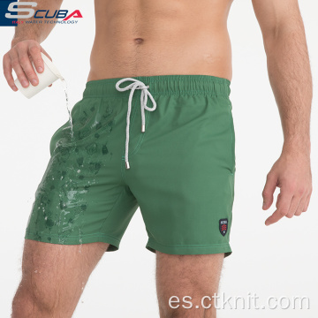 jeans de mezclilla verde para hombre